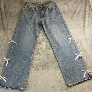 Light Wash Flare Jeans with Pink Bow Trim size 9